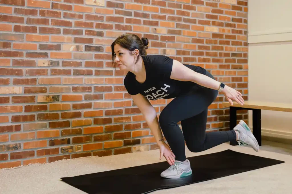 Tone Your Arms in Just One Week: Achieve Results Without the Gym! 1 A person exercising their arms at home with light weights Harefield