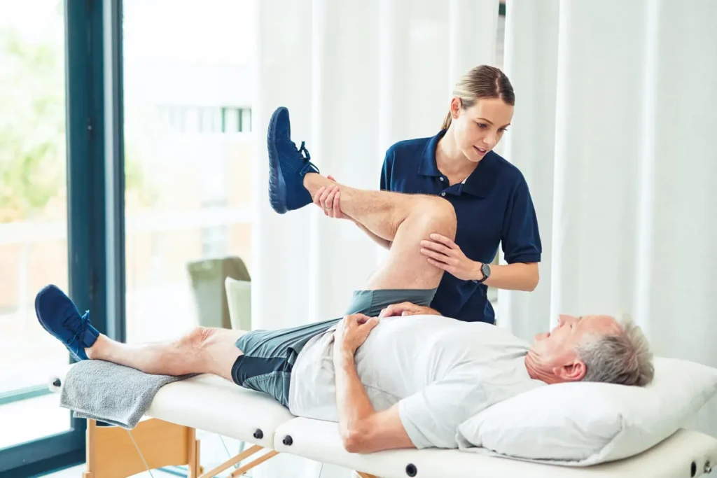 Revitalising Recovery: Effective Rehabilitation Strategies for Muscle Injuries 3 Physiotherapist assisting a patient with muscle recovery exercises Harefield