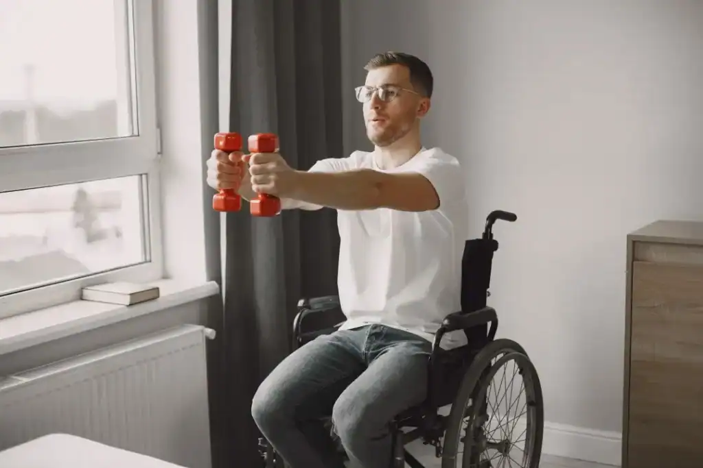 Image of man doing exercise in his wheelchair to aid weight loss Harefield