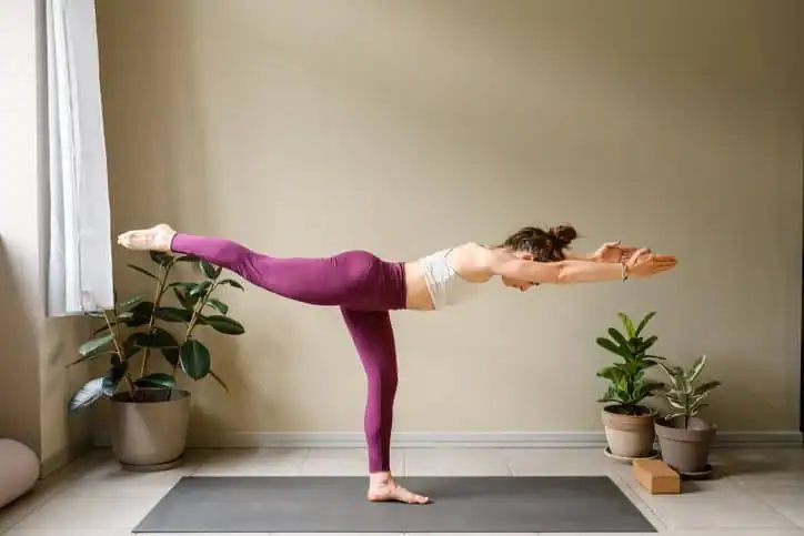 Achieving the Perfect Tone: How Often Should You Exercise for Results? 1 Woman doing Yoga exercise Harefield to help with toning the body.